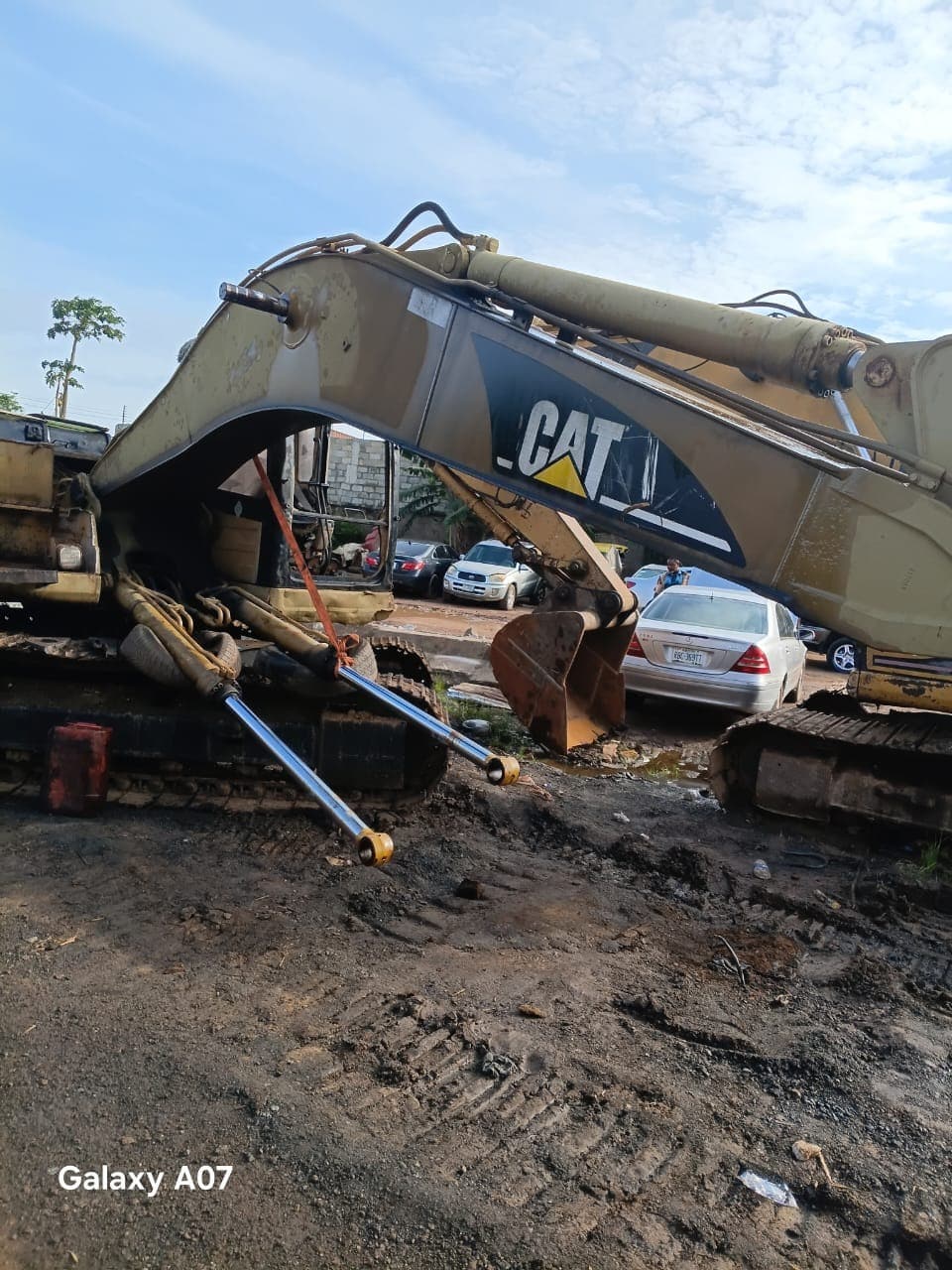 Excavator with boom cylinders