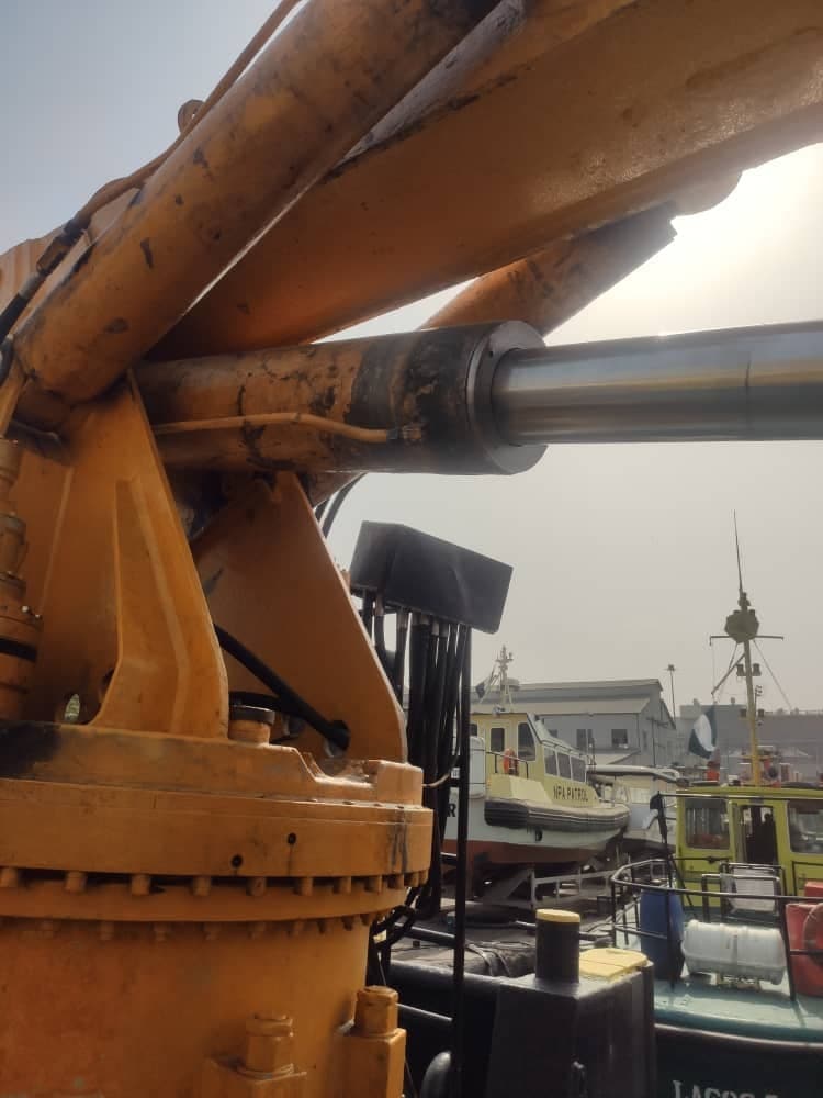 Slewing cylinder on a ship crane at a Lagos port