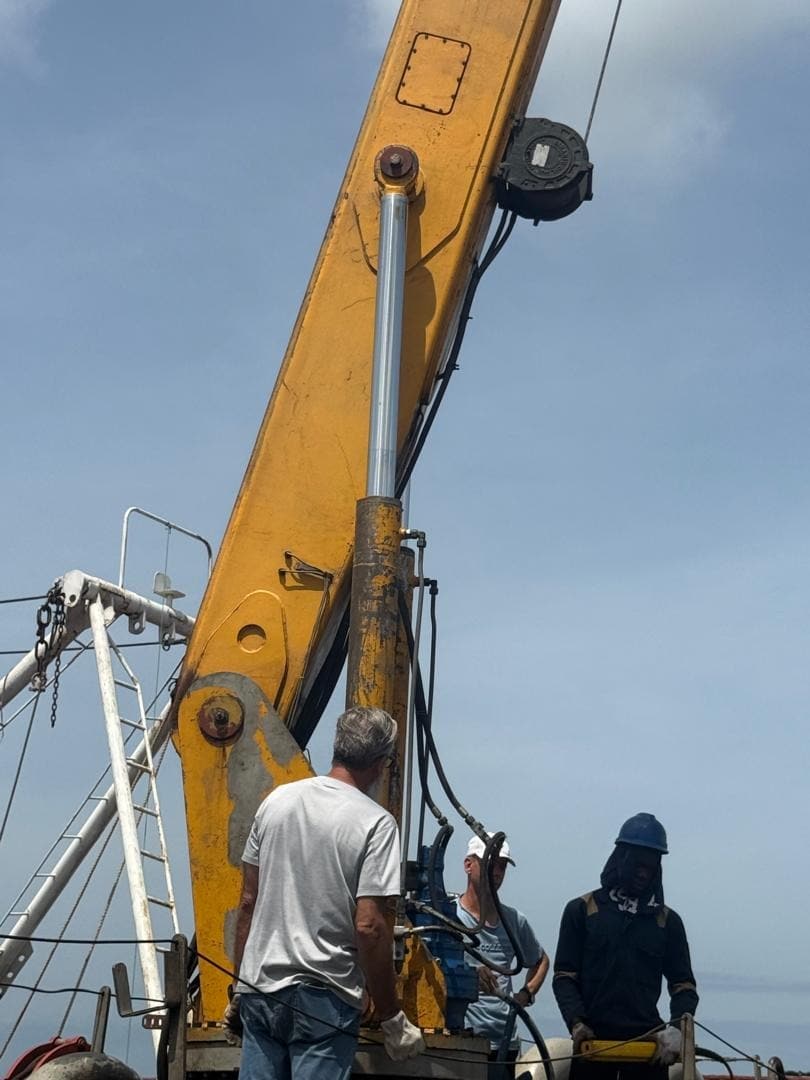 Eumid team working on ship crane hydraulics at the port